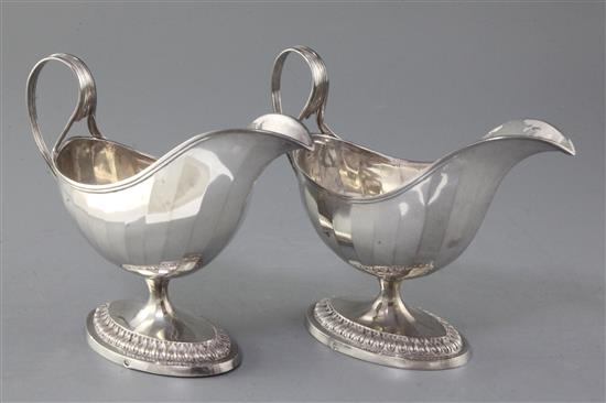 A pair of late 18th/early 19th century Belgian? silver pedestal sauce boats, 19.5 oz.
